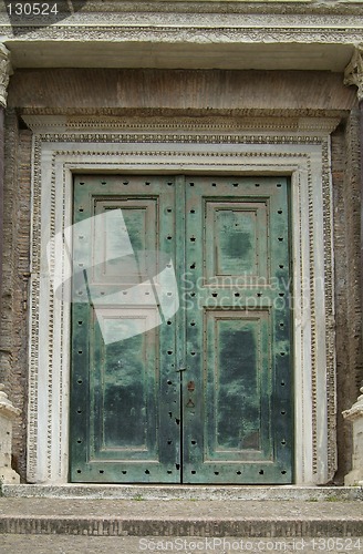 Image of Heavy, green door in Rome