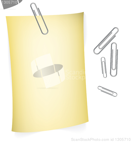 Image of Yellow paper with paperclips