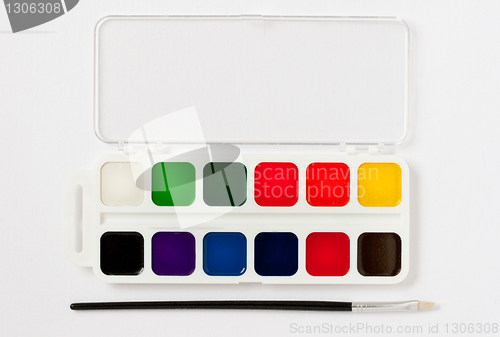 Image of paint box and brush