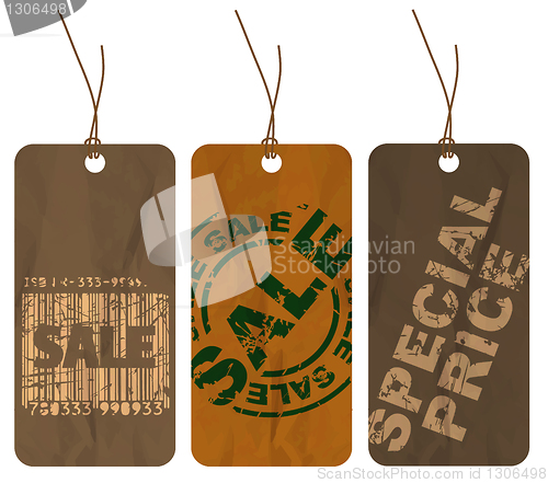 Image of Set of brown crumpled paper tags