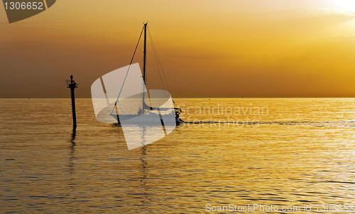 Image of Sailboat at dawn