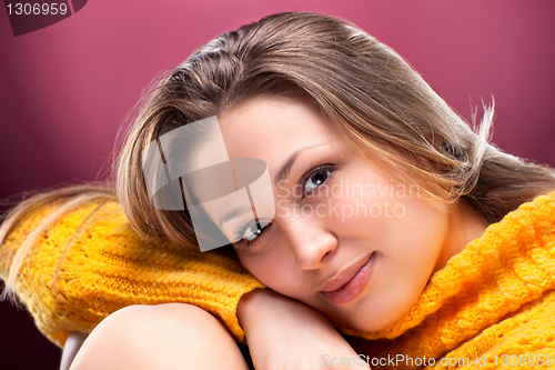 Image of Perfect blonde on red background