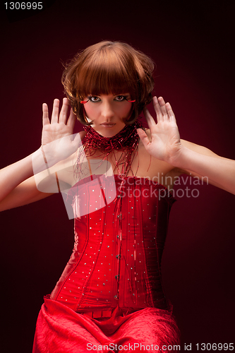 Image of Beautiful girl in red dress
