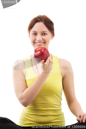 Image of woman in sportswear with apple