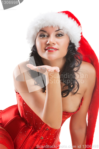 Image of Beautiful christmas woman in santa hat