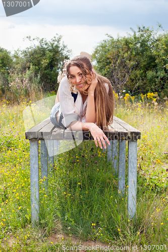 Image of Portrait of the beautiful woman outdoors