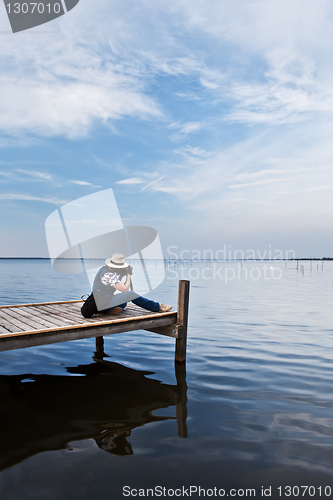 Image of The photographer  working on the lake