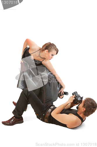 Image of Young adult female model and photographer.