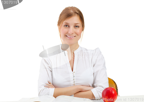 Image of woman with apple and book