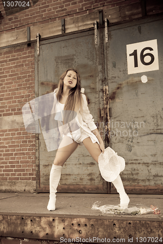 Image of beautiful young girl in white.