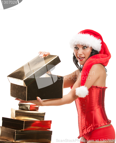 Image of Beautiful christmas woman in santa hat