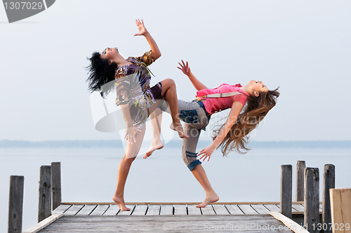 Image of two girl  are dancing