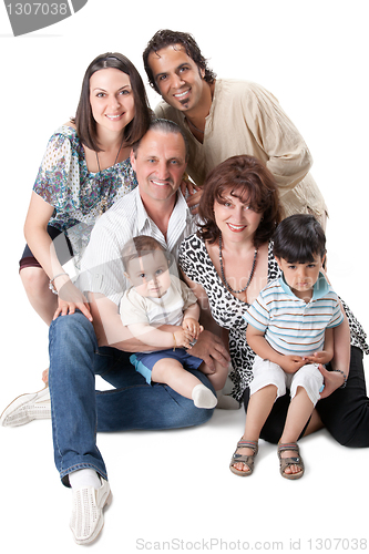 Image of Studio Shot Of Family Group Sitting In Studio