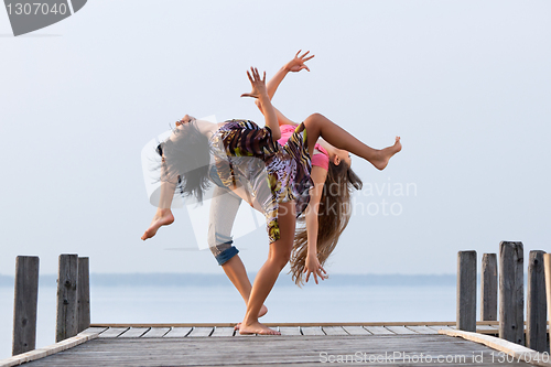 Image of two girl  are dancing