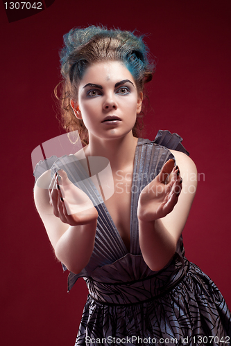 Image of beauty alien woman in futuristic dress