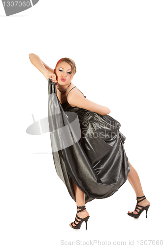 Image of beautiful young woman in long dress
