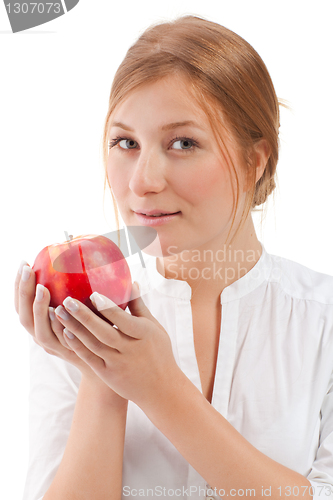 Image of Beautiful woman holding apple