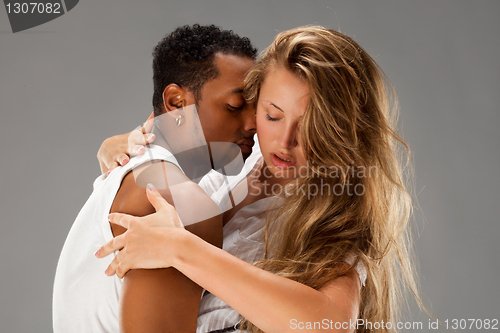 Image of Young couple dances Caribbean Salsa