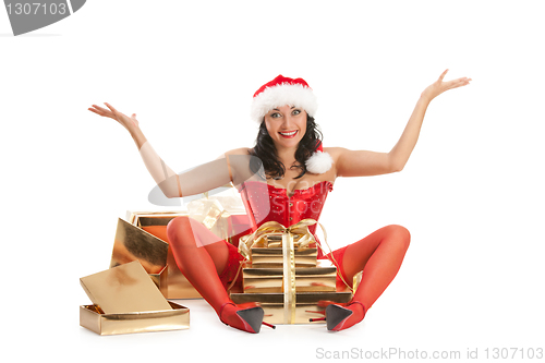 Image of Beautiful christmas woman in santa hat