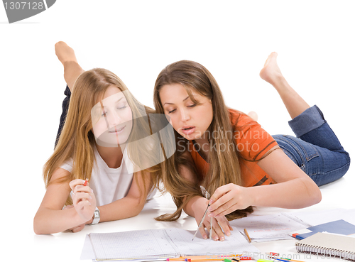 Image of two young happy student girl, isolated on white