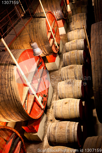 Image of wine barrels in a winery, France