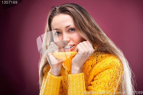 Image of Perfect blonde on red background