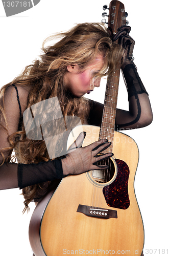 Image of rocker girl with acoustic guitar