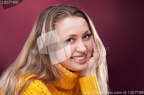 Image of Perfect blonde on red background
