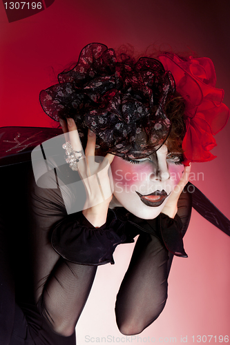 Image of woman mime with theatrical makeup