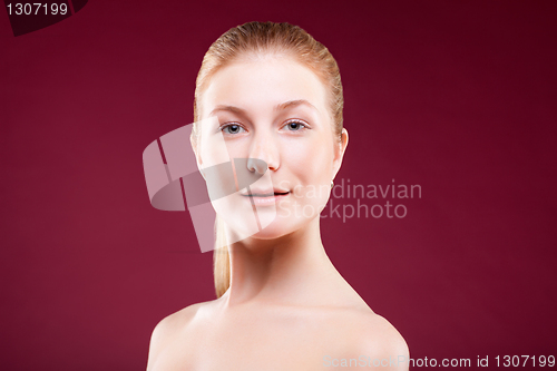 Image of Portrait of a young lady on red