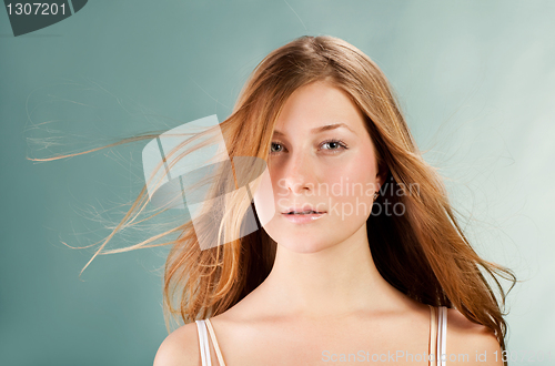 Image of pretty red-haired young woman