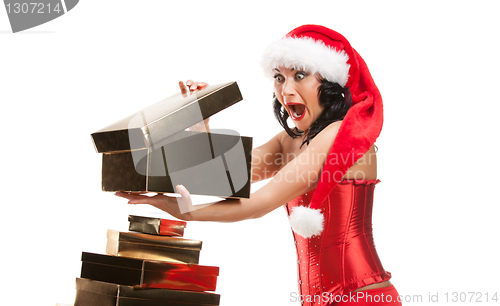 Image of Beautiful christmas woman in santa hat