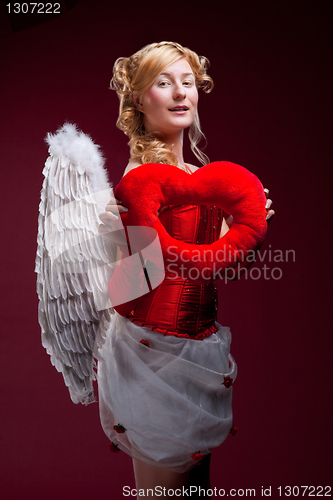 Image of Perfect blonde angel with a red heart