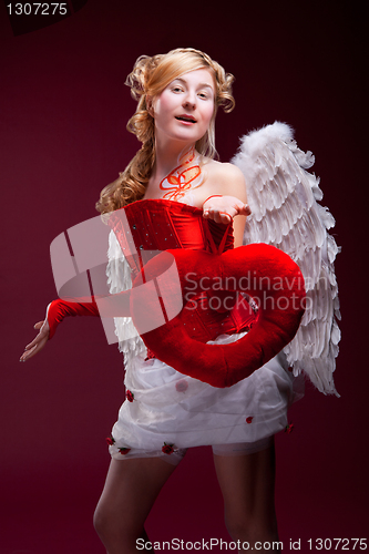 Image of Perfect blonde angel with a red heart