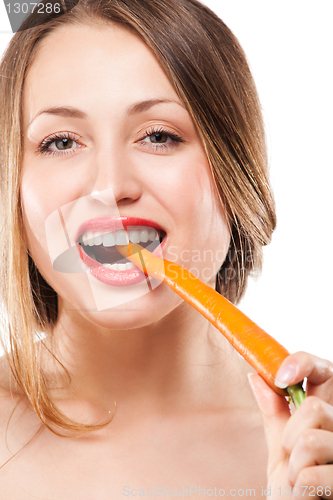 Image of blonde woman eating carrot
