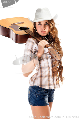 Image of Sesy cowgirl in cowboy hat with acoustic guitar