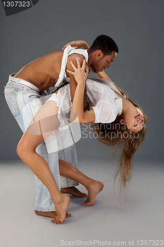 Image of Young couple dances Caribbean Salsa