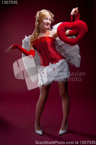 Image of Perfect blonde angel with a red heart