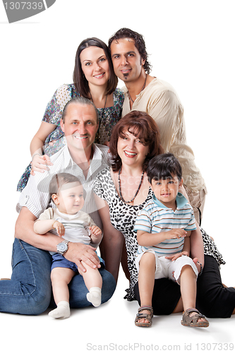 Image of Studio Shot Of Family Group Sitting In Studio