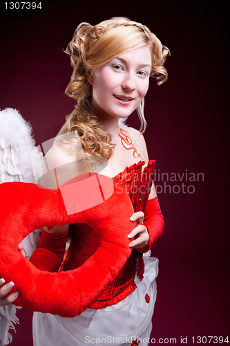 Image of Perfect blonde angel with a red heart