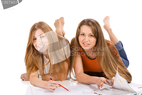 Image of two young happy student girl, isolated on white