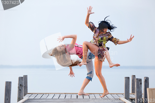 Image of two girl  are dancing