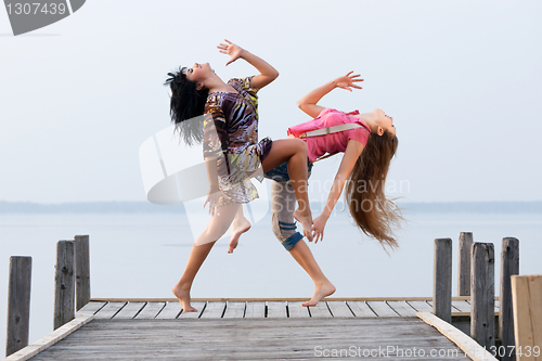 Image of two girl  are dancing