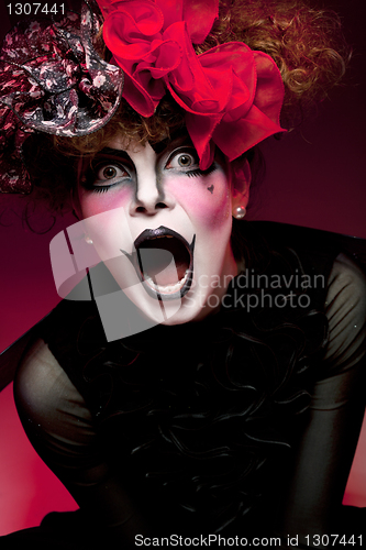 Image of woman mime with theatrical makeup