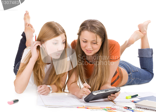 Image of two young happy student girl, isolated on white