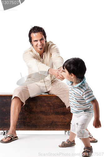 Image of Father and little son studio portrait