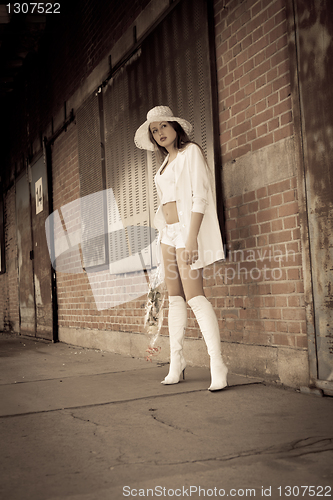 Image of beautiful young girl in white.