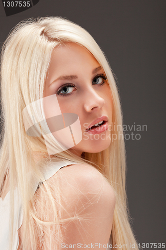 Image of young woman close up studio portrait