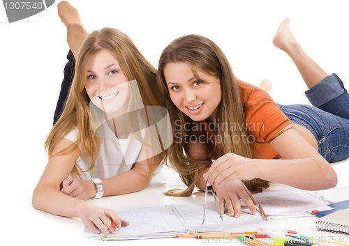 Image of two young happy student girl, isolated on white