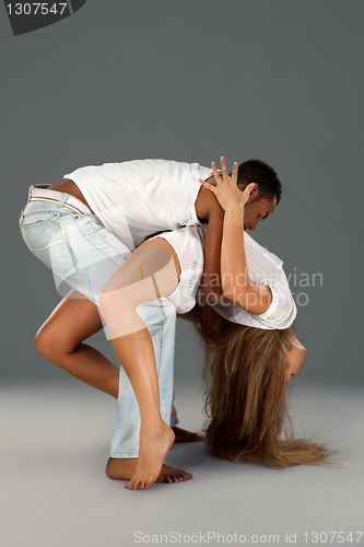 Image of Young couple dances Caribbean Salsa